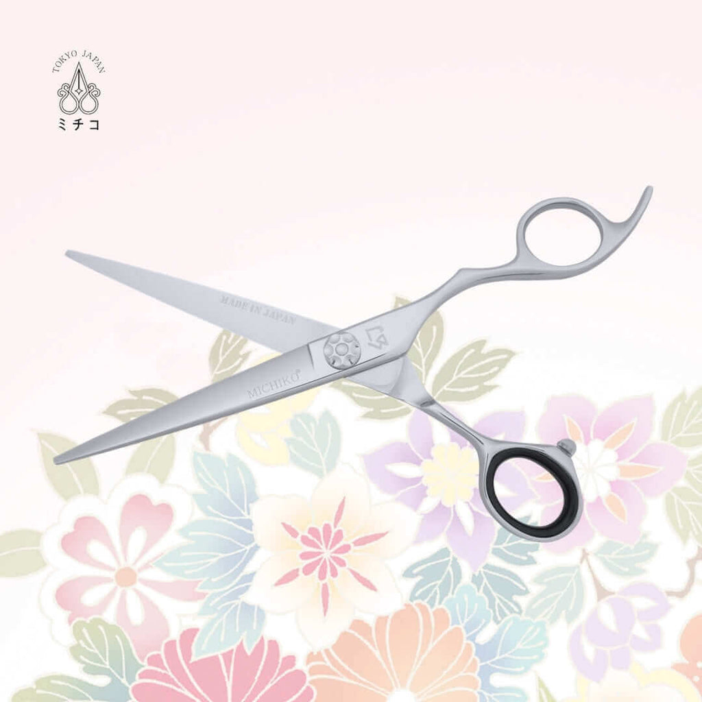 MICHIKO NIGATA 6.5-inch authentic Japanese hairdressing scissors in an open position, showing the 'Made in Japan' mark on the inside of the cutting blade.