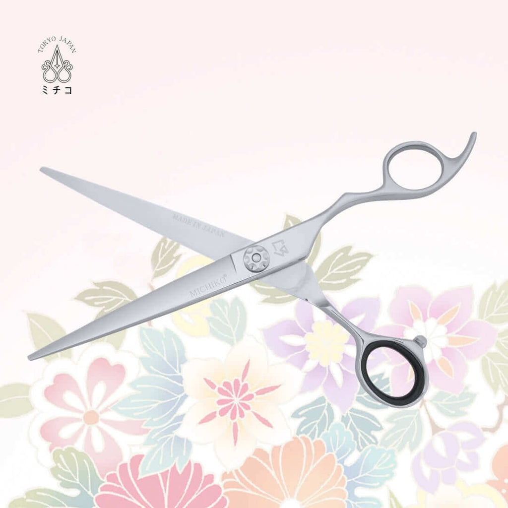 MICHIKO NIGATA 7.0-inch authentic Japanese hairdressing scissors in an open position, showing the 'Made in Japan' mark on the inside of the cutting blade.